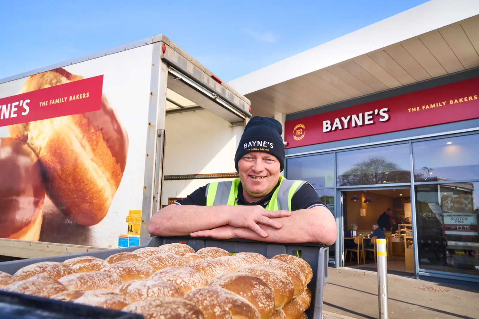 A Bayne’s driver with a tray of morning rolls